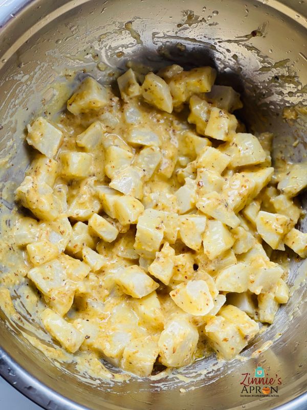 mix-the-mixture-with-the-potatoes. 