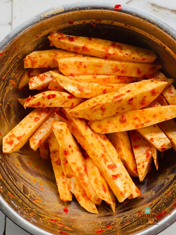 turn-and-mix-the-ingredients-as-for-your-crispy-oven-baked-potato-fries