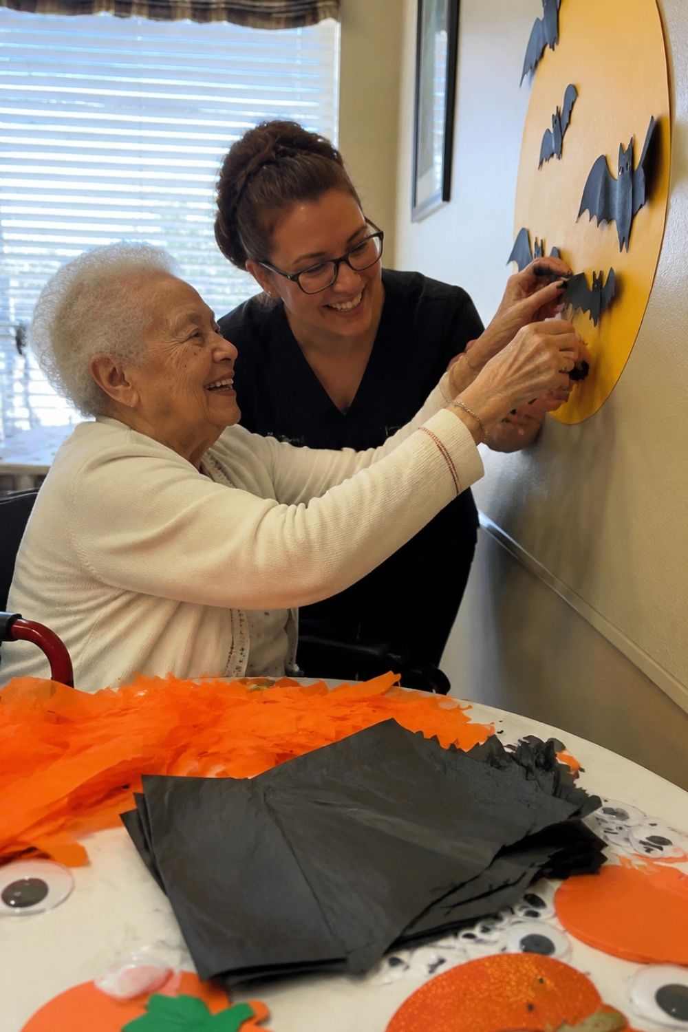 halloween-party-assisted-living-resident-decorating-common-room