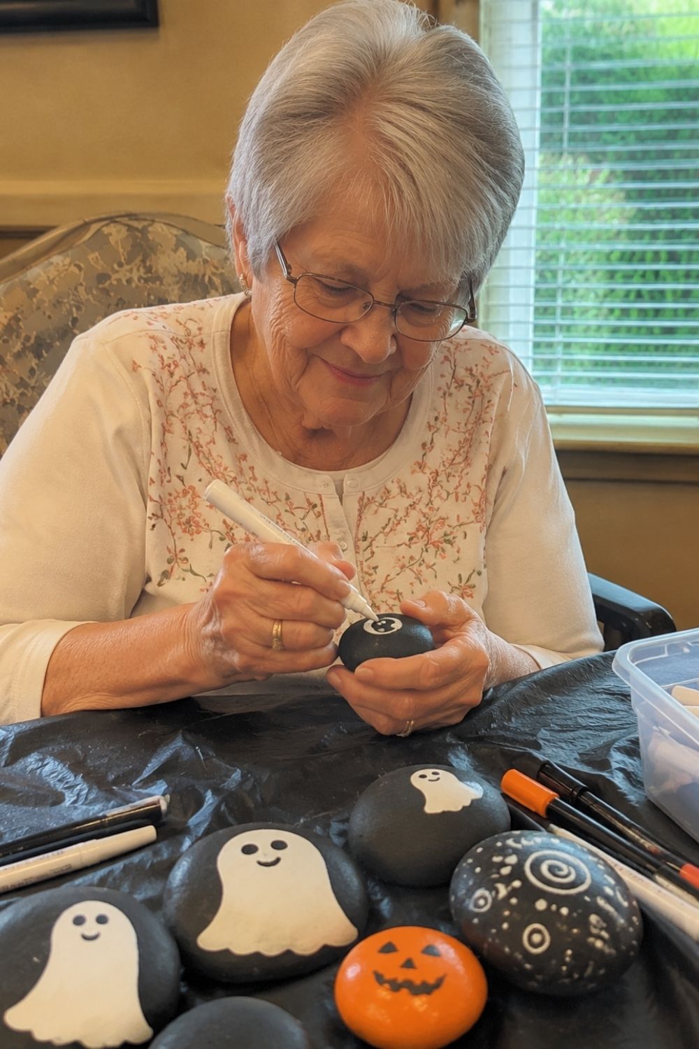 halloween-party-assisted-living-rock-painting-ghosts-pumpkins