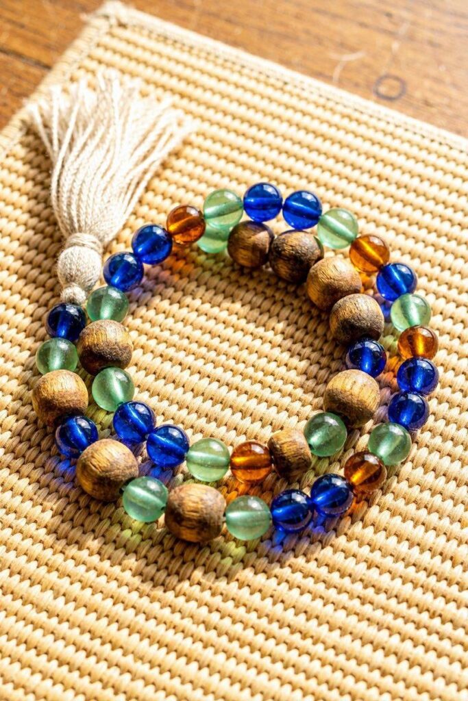A_short_strand_of_textured_mixed_beads_smooth_glass_