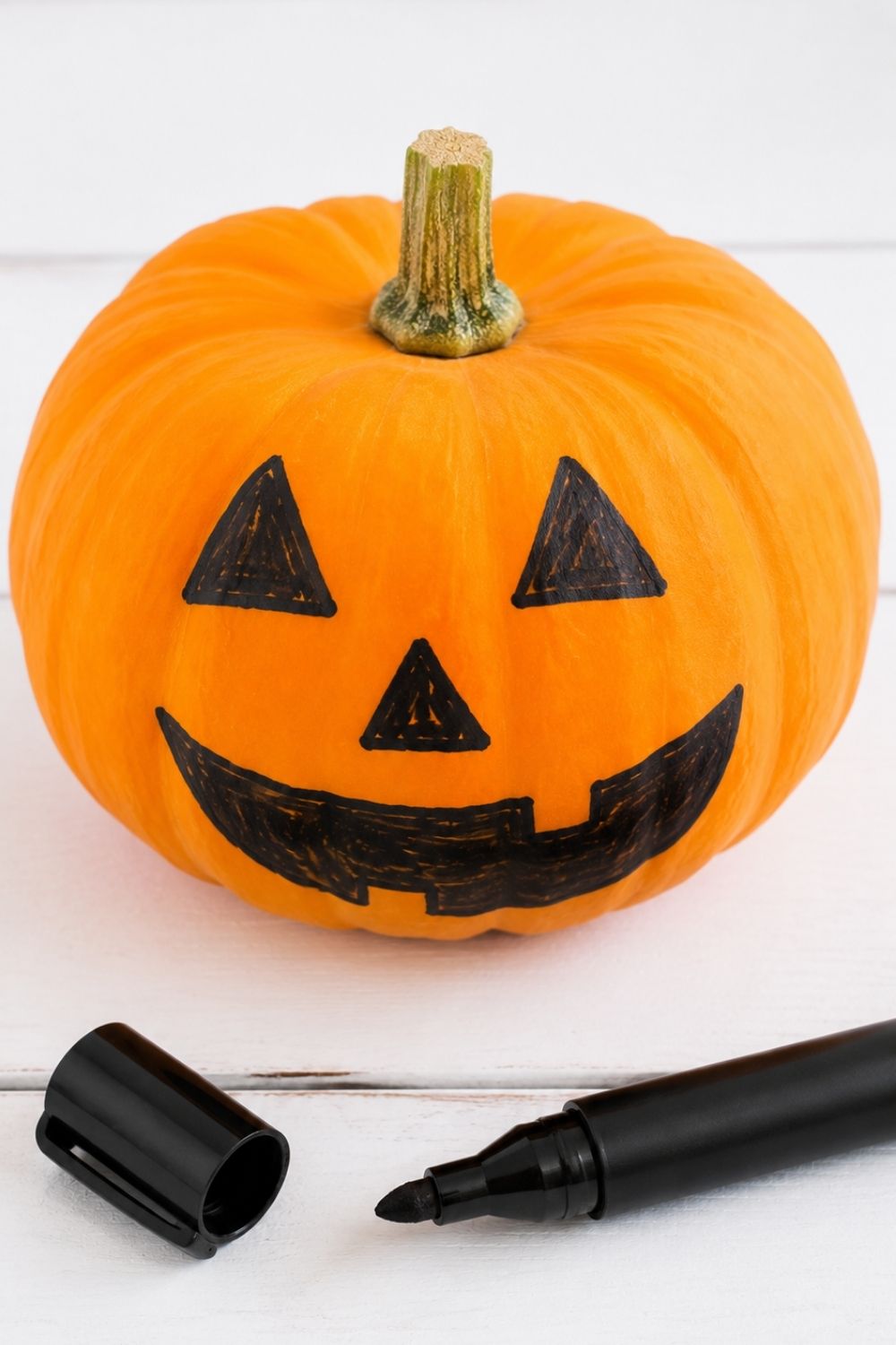 halloween-crafts-dementia-patients-marker-face-pumpkin