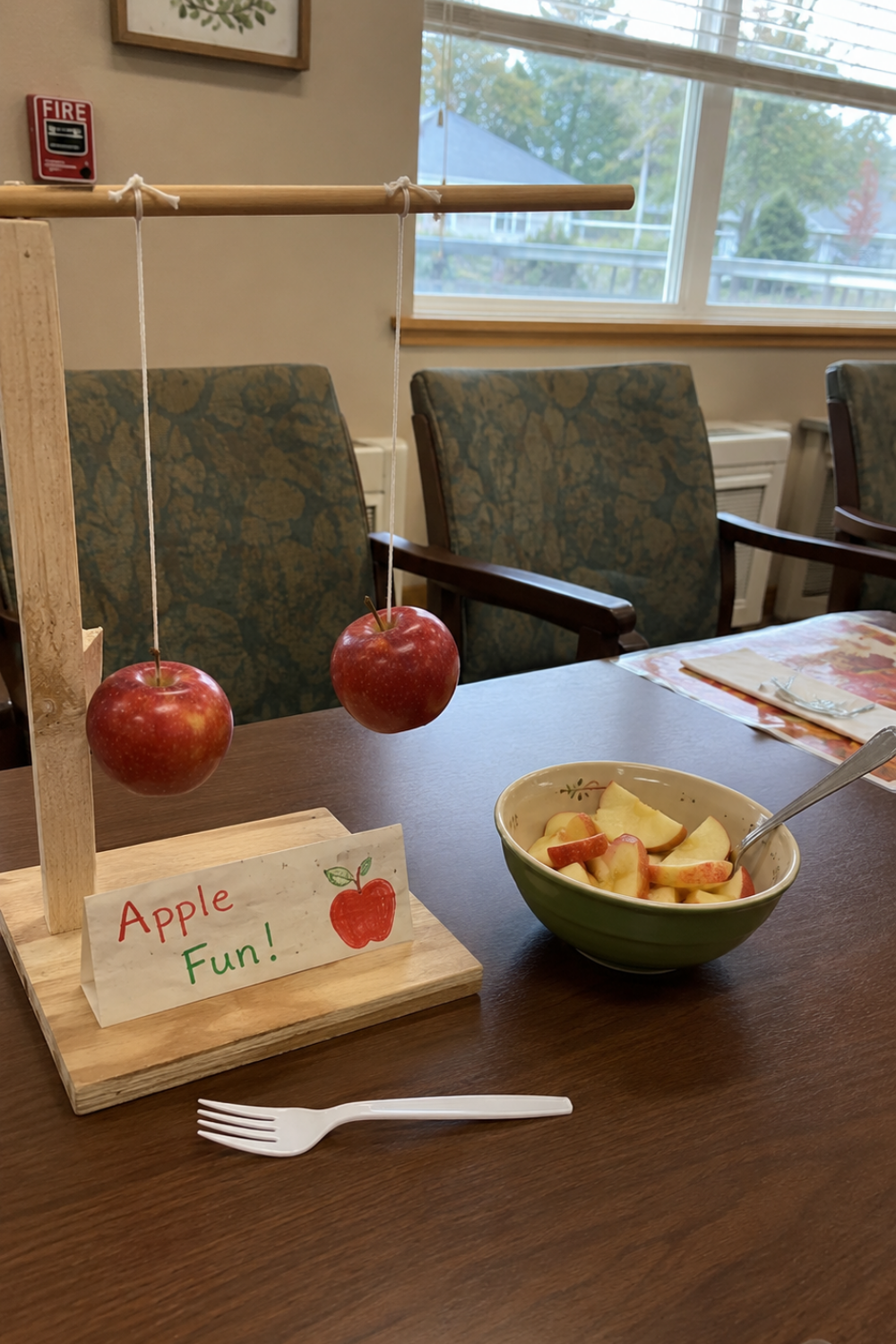 halloween-party-games-senior-citizens-fork-apple-bobbing