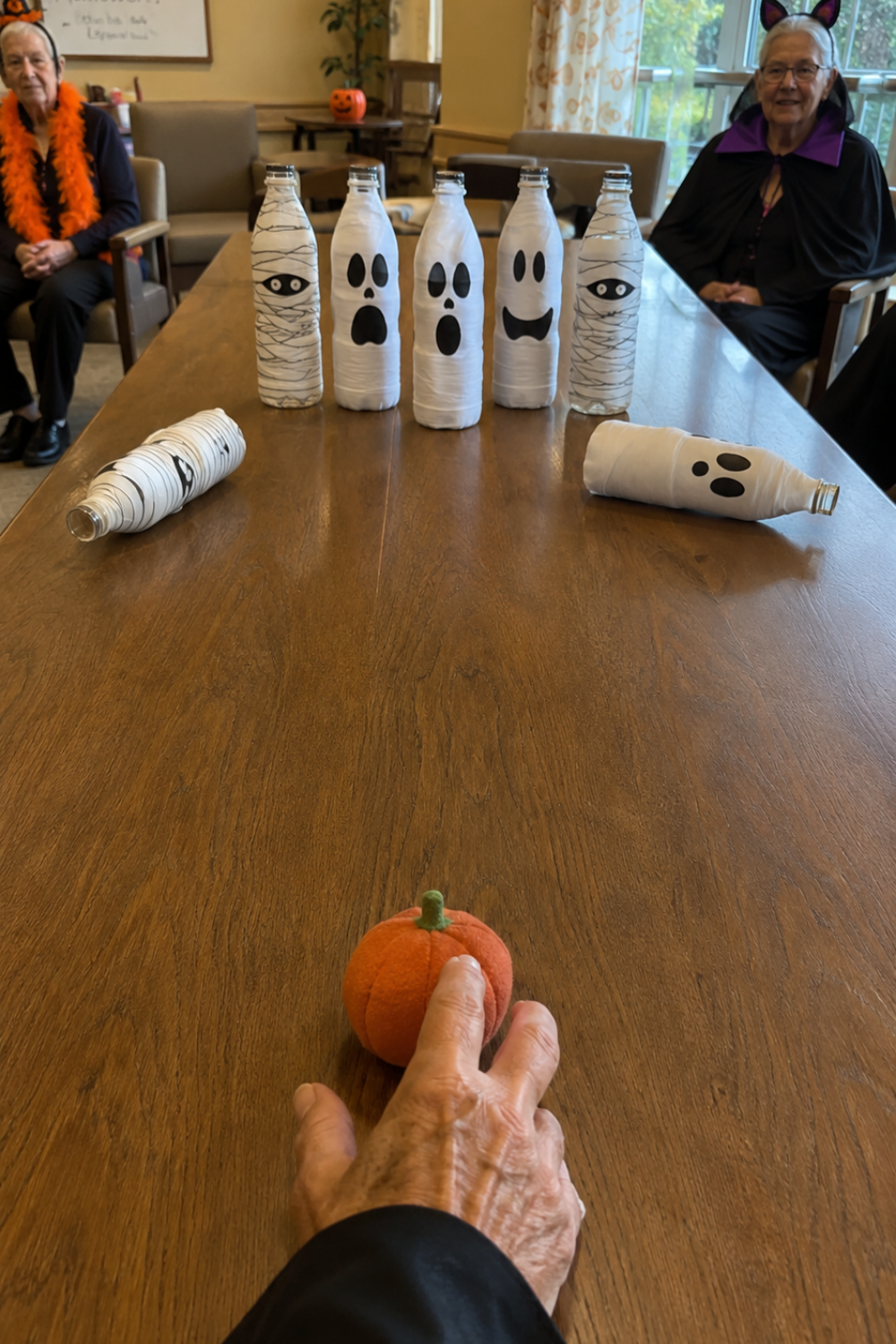 halloween-party-games-senior-citizens-tabletop-pumpkin-bowling