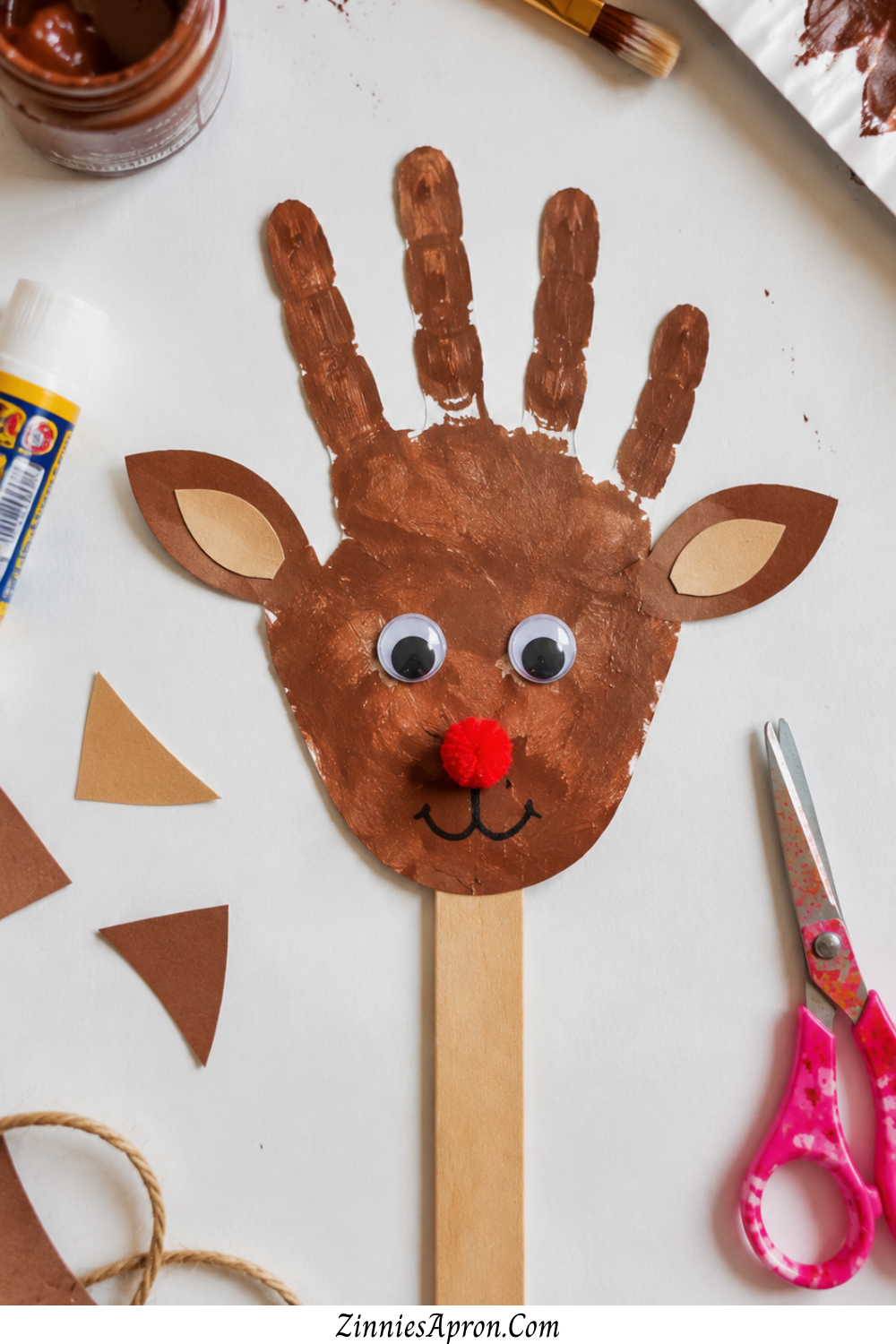 handprint-fall-deer-crafts-kids-popsicle-stick-puppet