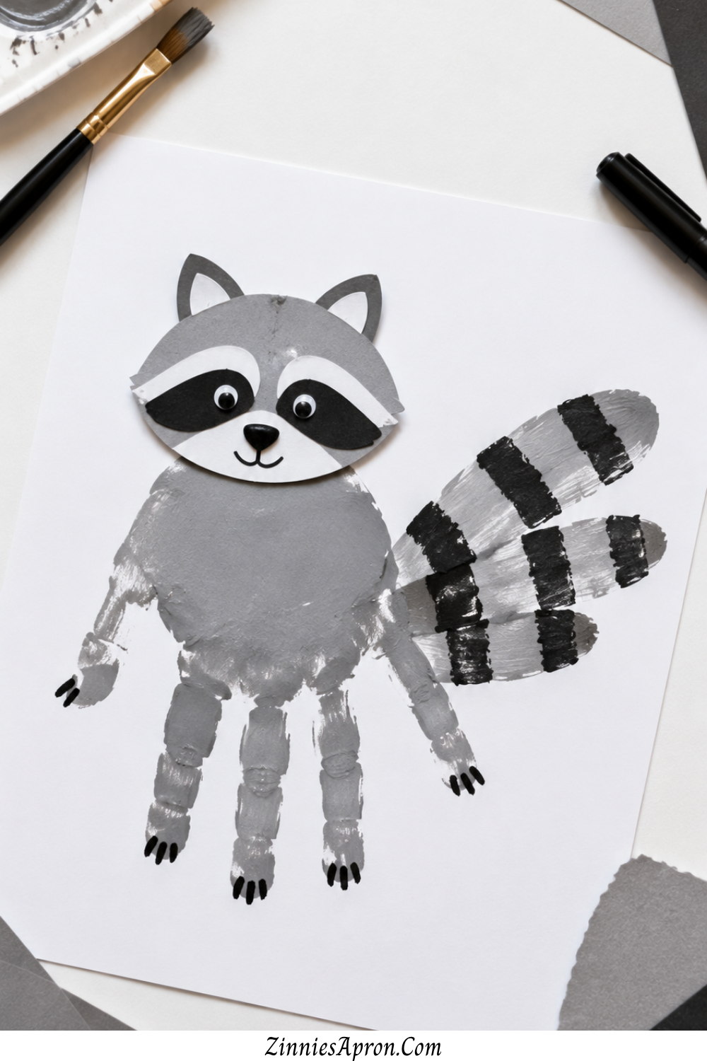woodland-animal-crafts-for-preschool-handprint-raccoon.jpg