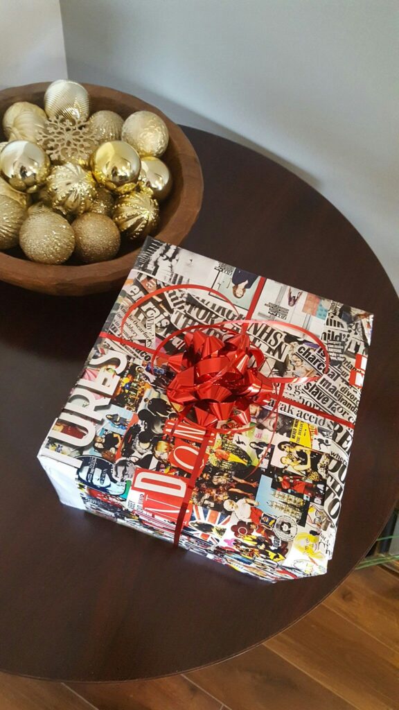 Turn-Magazine-Pages-Into-Colourful-Christmas-Gift-Wrap